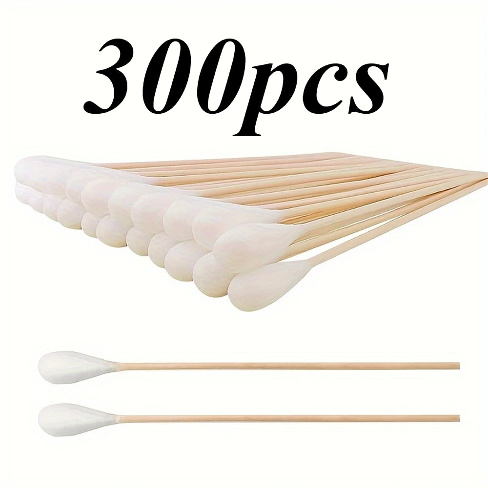 300 pieces of precision wooden cotton swabs arranged in a fan shape.