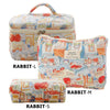 Three sizes of quilted cotton makeup bags featuring colorful floral patterns and fabric patches.