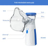 A clear facial steamer and humidifier device with a top cover, indicator light, switch, and battery compartment.