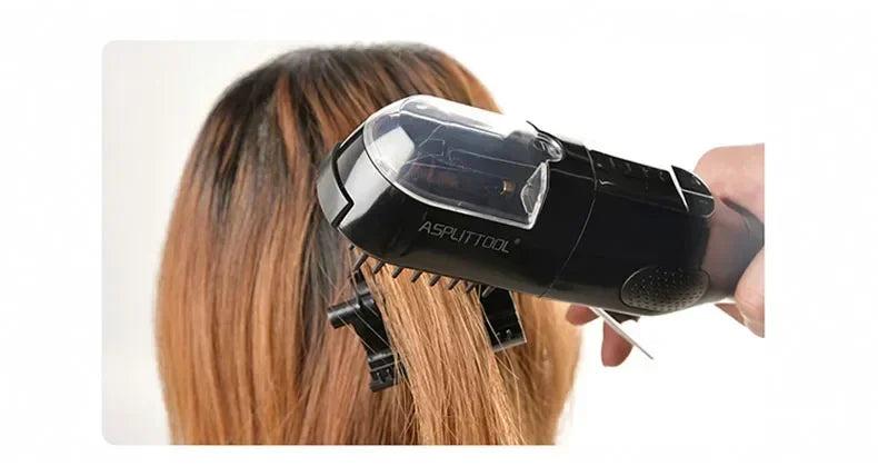 A hand is using a black cordless hair trimmer to cut split ends on a person's hair.