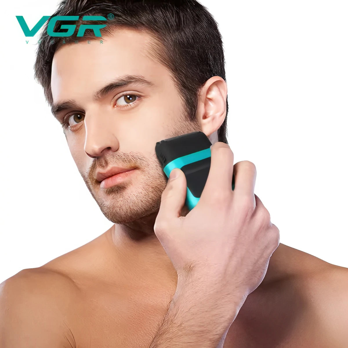 A man is using a black and teal electric hair trimmer on his ear.