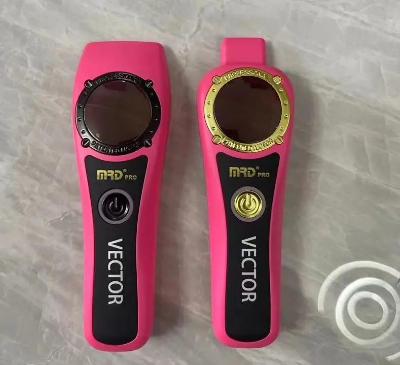A pink professional electric hair trimmer with a black body and gold accents is shown against a light background.