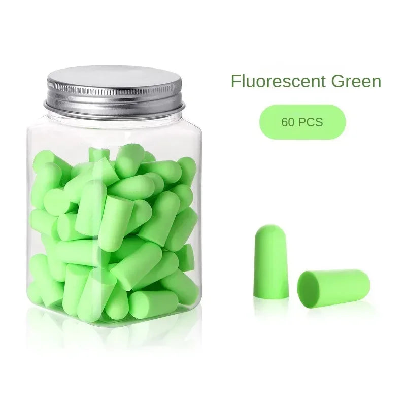 A jar of fluorescent green earplugs with individual plugs displayed next to the container.